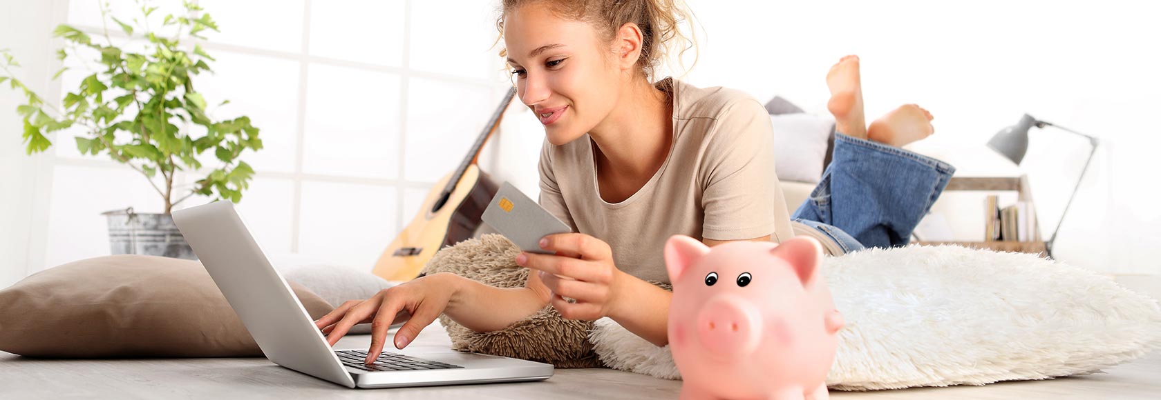 Woman with card on bed
