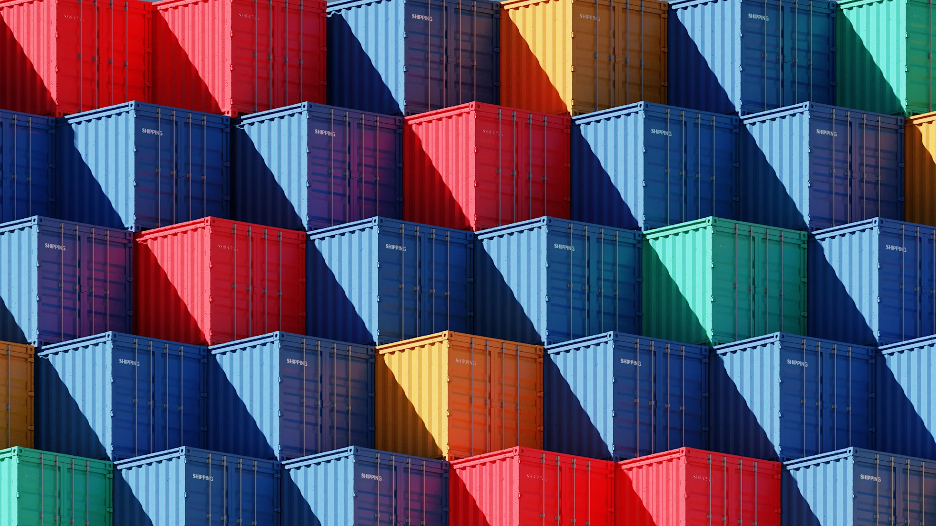 Multicoloured shipping containers stacked together.