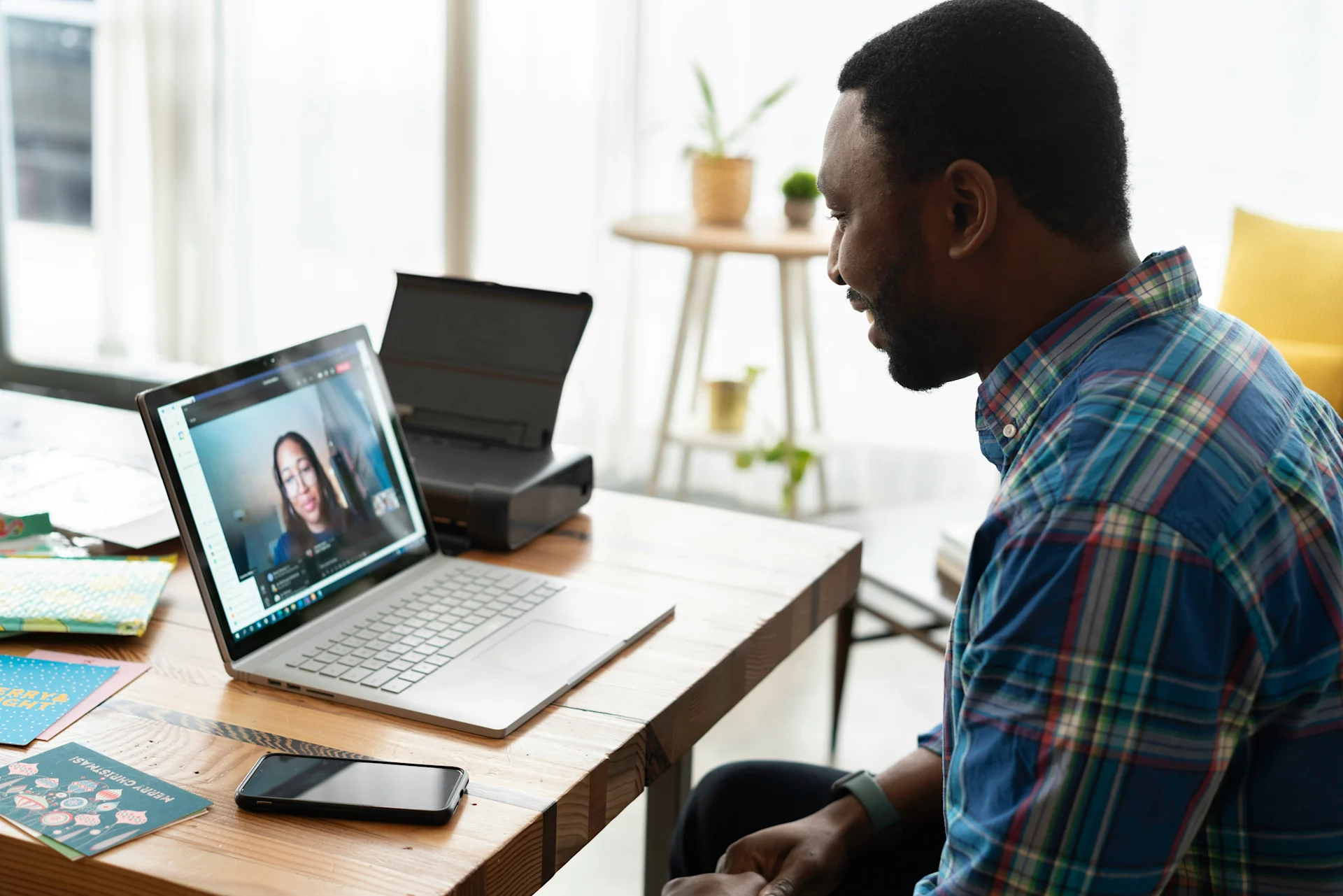 People having video call on laptop