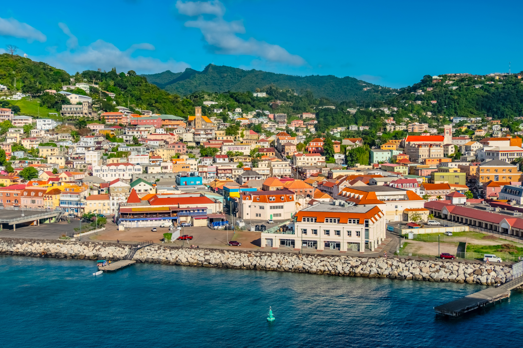 Dominica houses on the rocky shore 