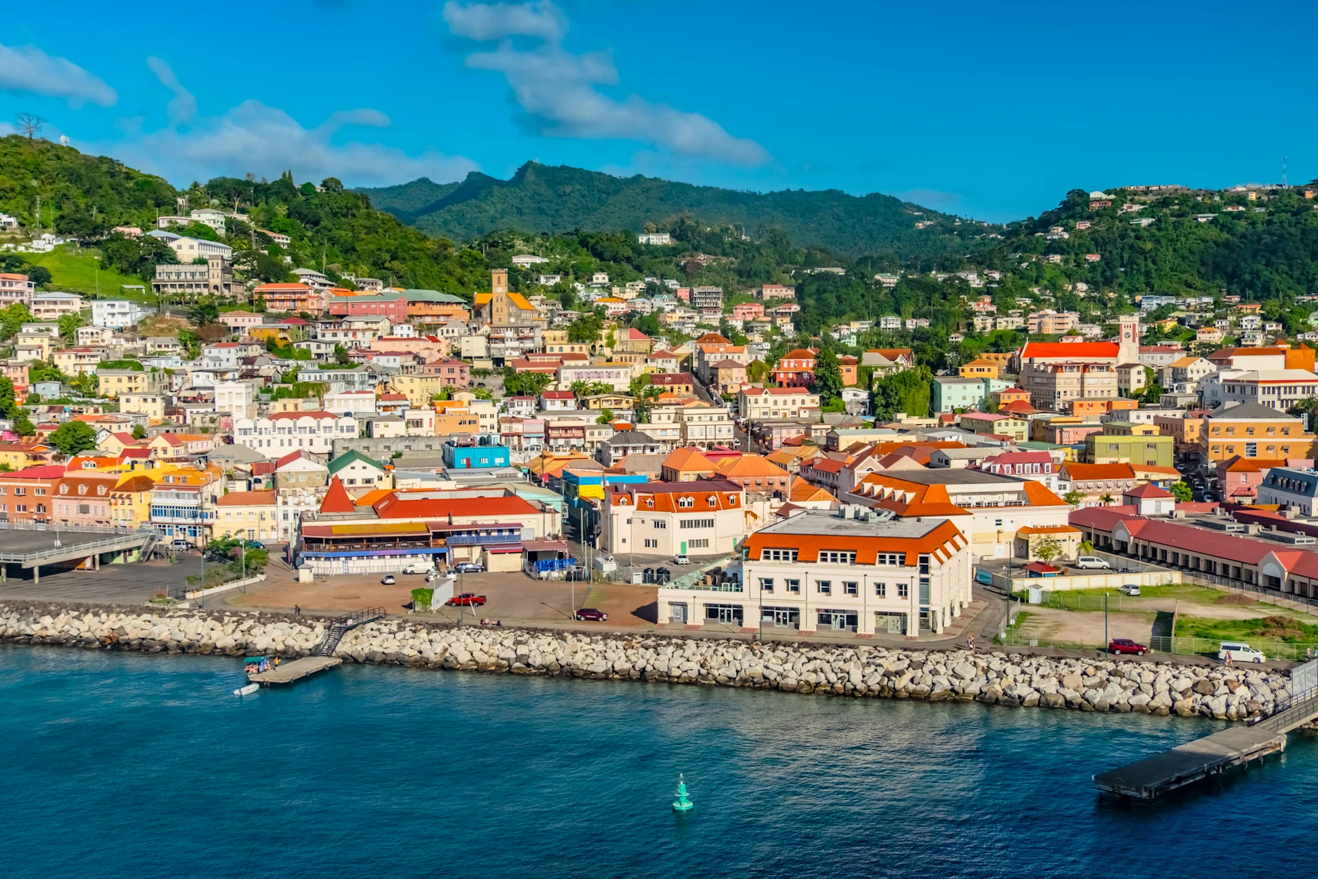 Dominica houses on the rocky shore