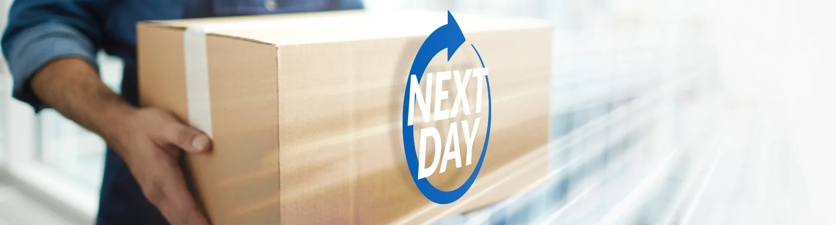 'Next Day' slogan with blue arrow on a box in man's hands with a blurred background