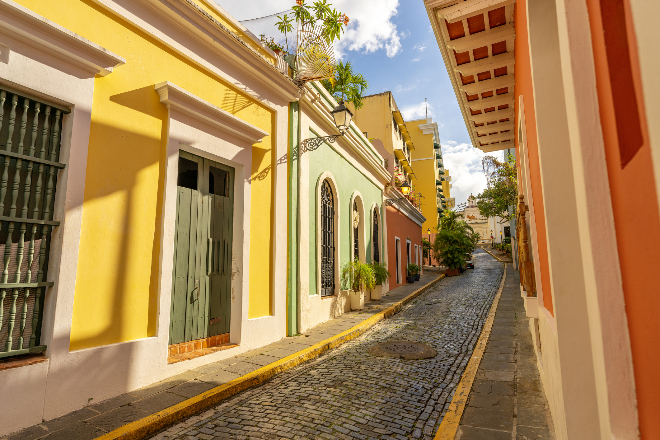 Street lined with colourful houses in Puerto Rico.