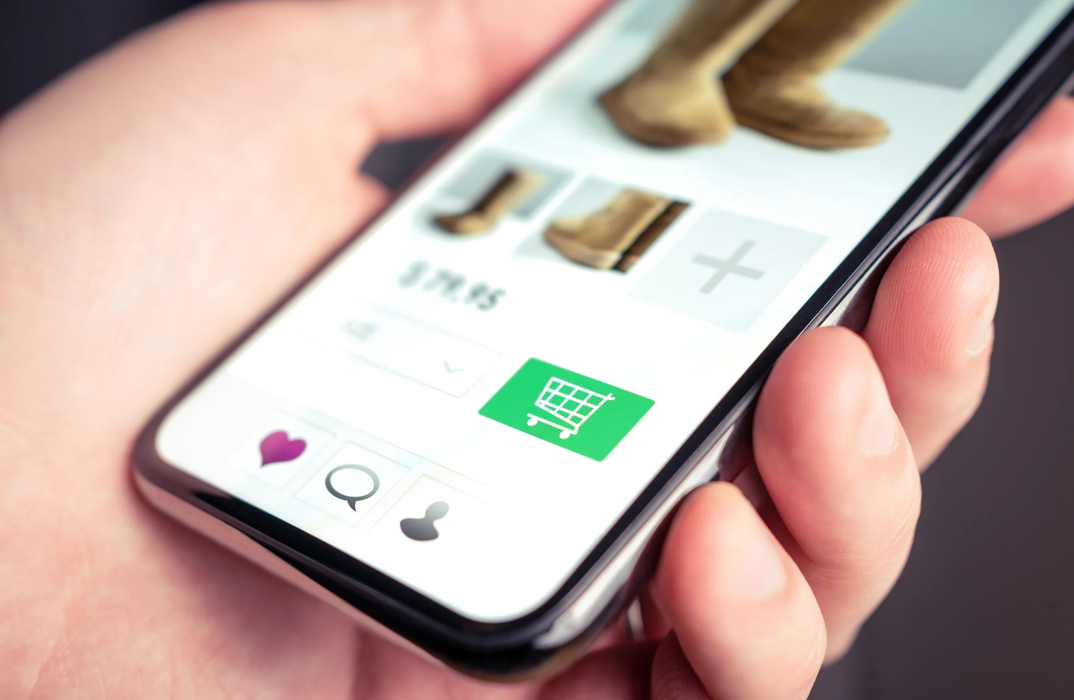 Person buying clothes on mobile phone