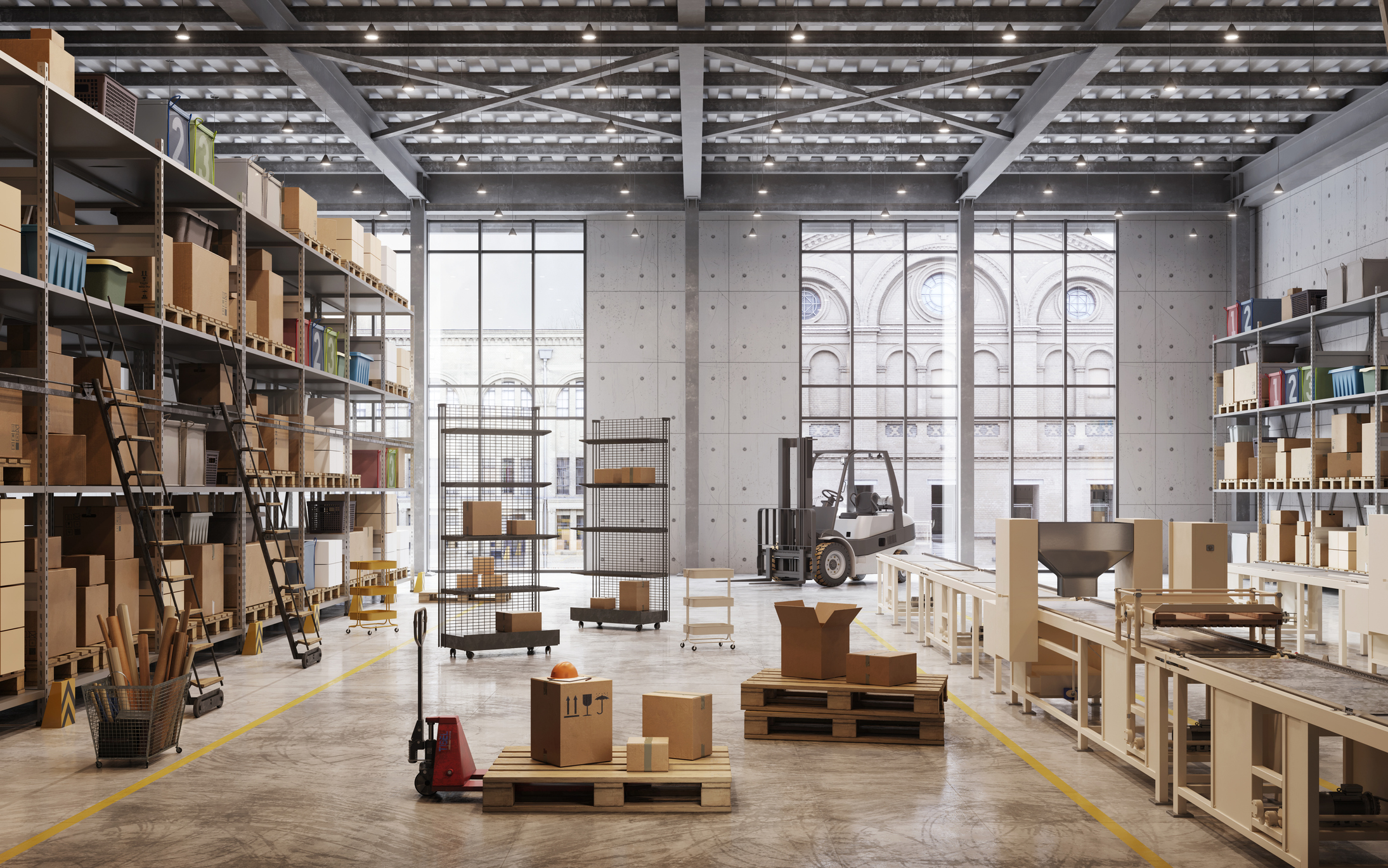 Large room with large windows, filled with metal shelves and parcel boxes.