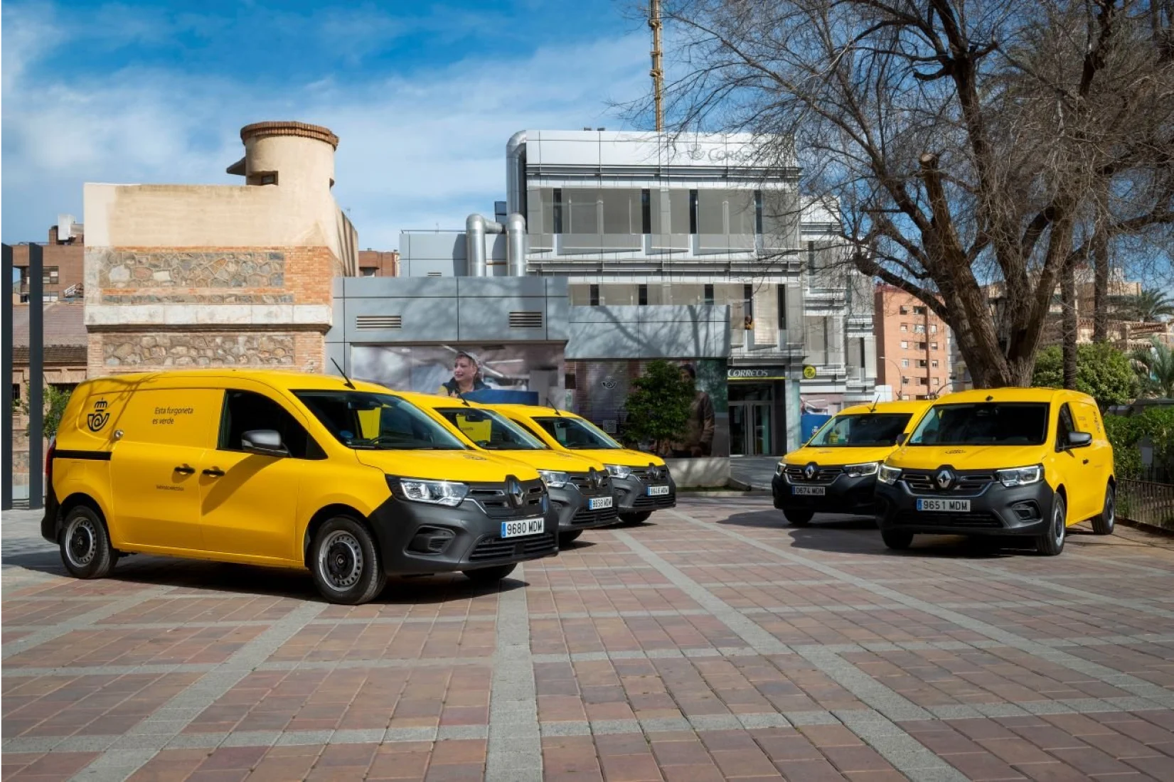 Correos Courier vans parked