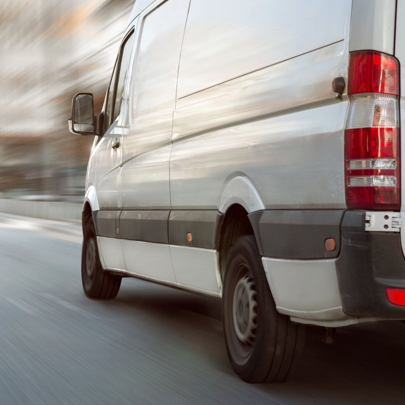 Close up of van driving quickly