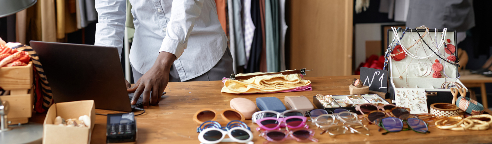 Man lists vintage clothing items online to sell 