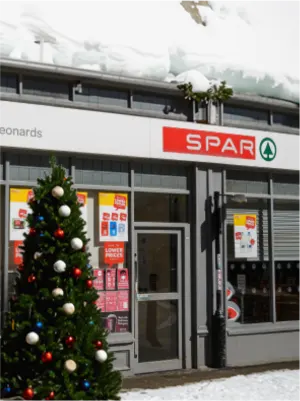 A Spar shop with a Christmas tree out the front