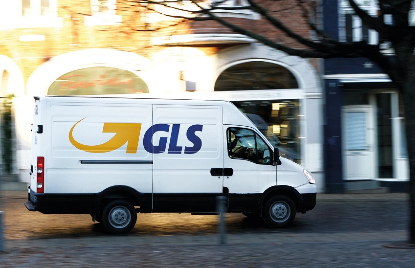 GLS Courier van moving down road