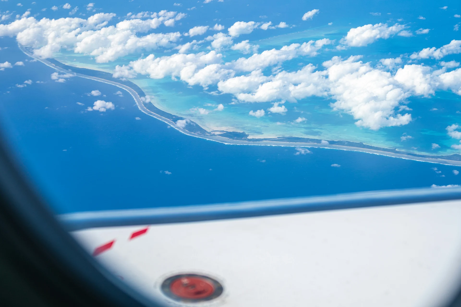 A view of the ocean from a plane window photo