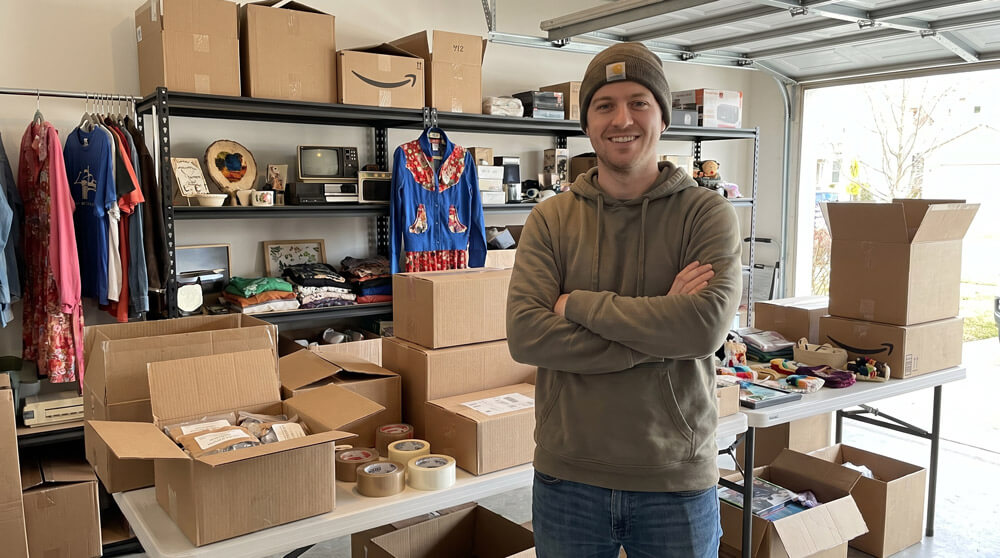 Man in garage with vintage items