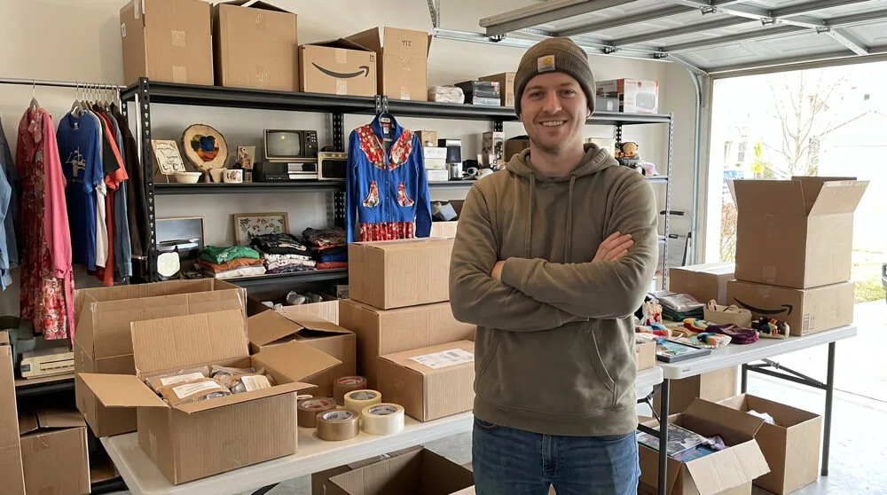 Man in garage with vintage items