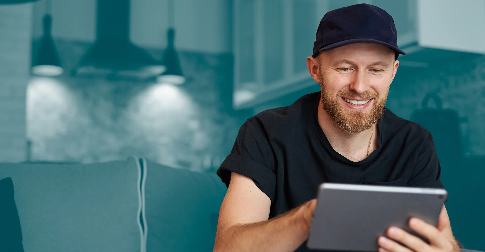 Man on Tablet with asendia branding in background