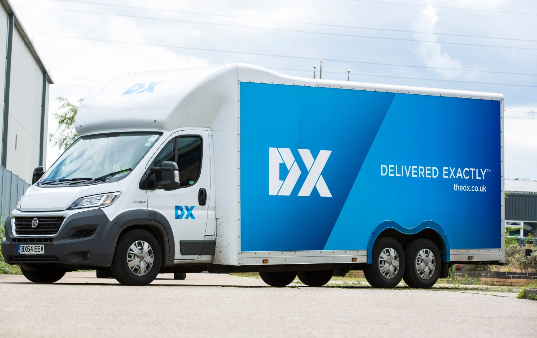 DX Courier Van parked outside