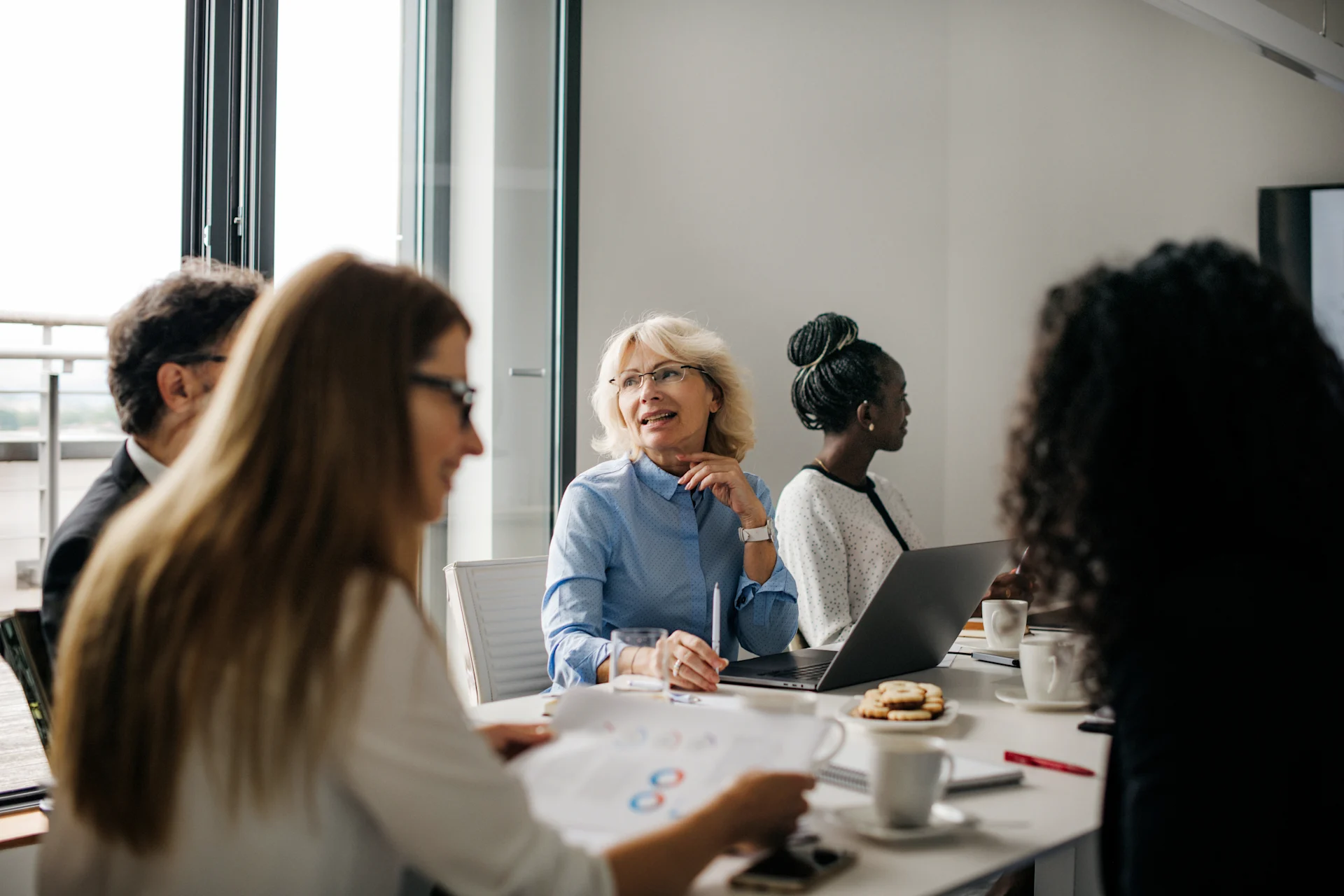 People sitting in a board room