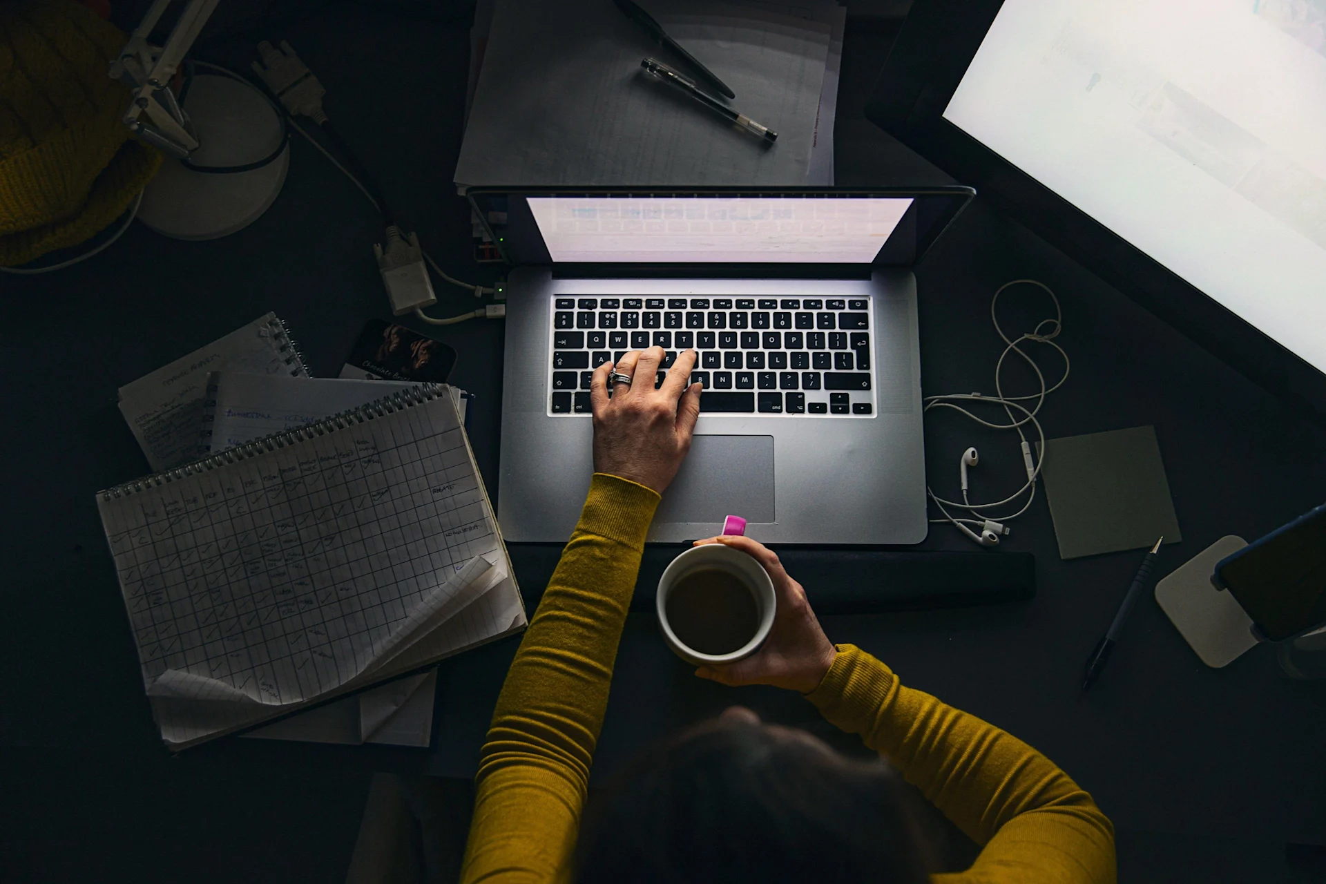 financial services woman at laptop with coffee