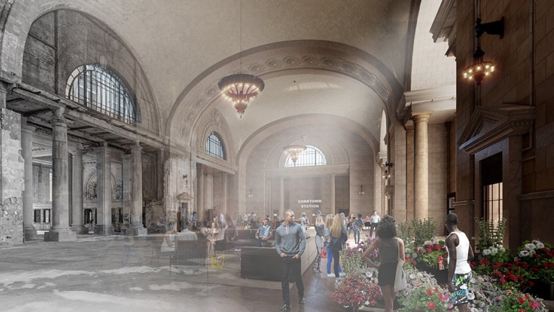 People gather in a large spacious room