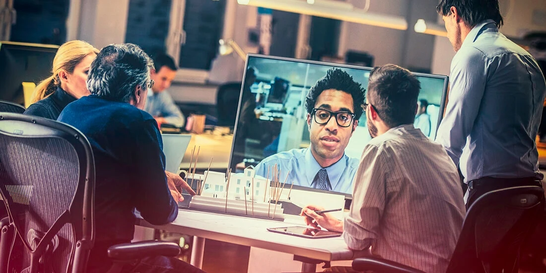 A team of architects holds a virtual meeting