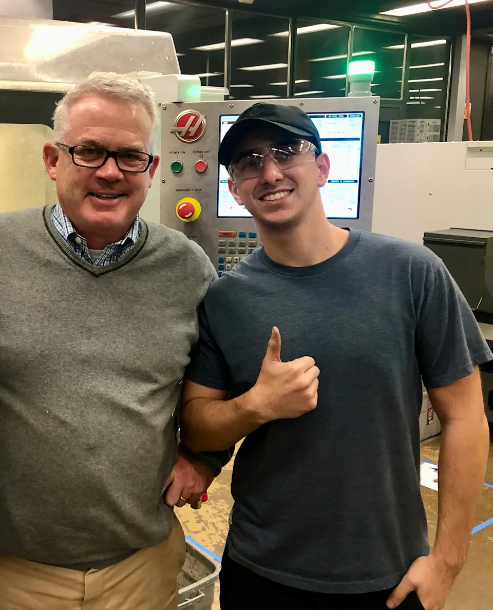Jeffrey Smith, Professor for Industrial Design,  Advanced Manufacturing & Robotics and Department Chair at Diablo Valley College, and Jacob Ramirez on campus.