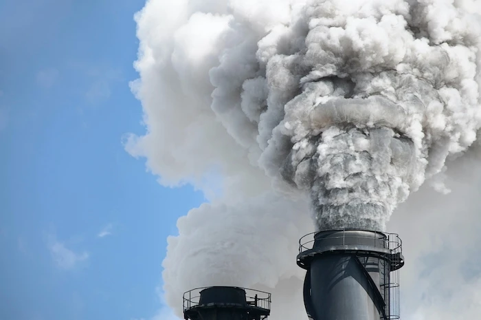 Smokestack billowing smoke