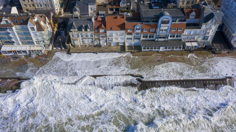 Carbon removal aerial shot of dike in France submerged by tides