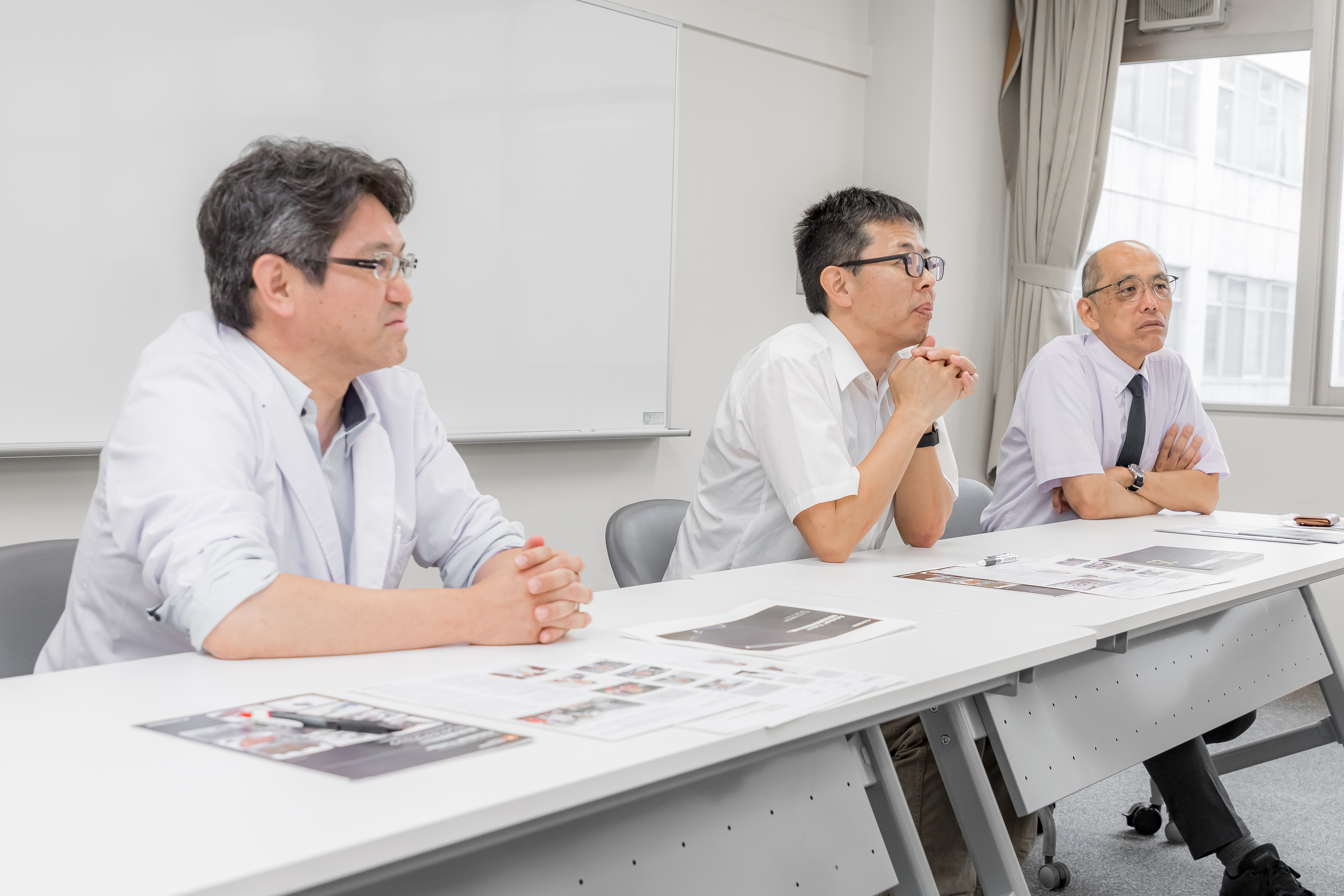 Professors Yuji Nakamura, Moeto Nagai, and Tadaharu Adachi from left to right.