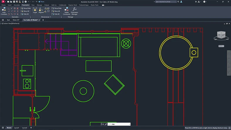  A software screen displays a colorfully lined CAD design on a black background.