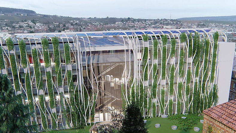 A biophilic building design features lush vegetation on the exterior.