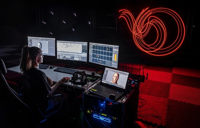 a media producer at a workstation