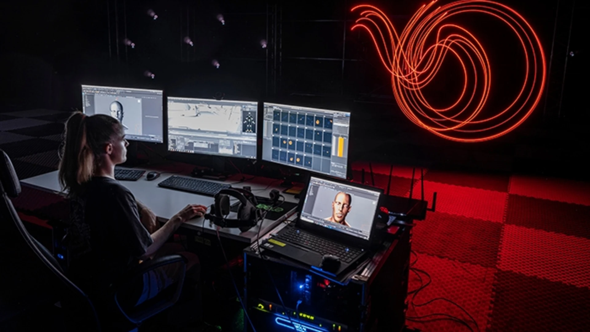 a media producer at a workstation