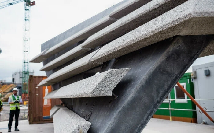 A section of the completed facade of the V&A Dundee being installed