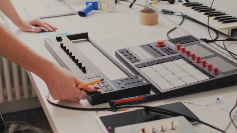 Product designer working on a Native Instruments keyboard