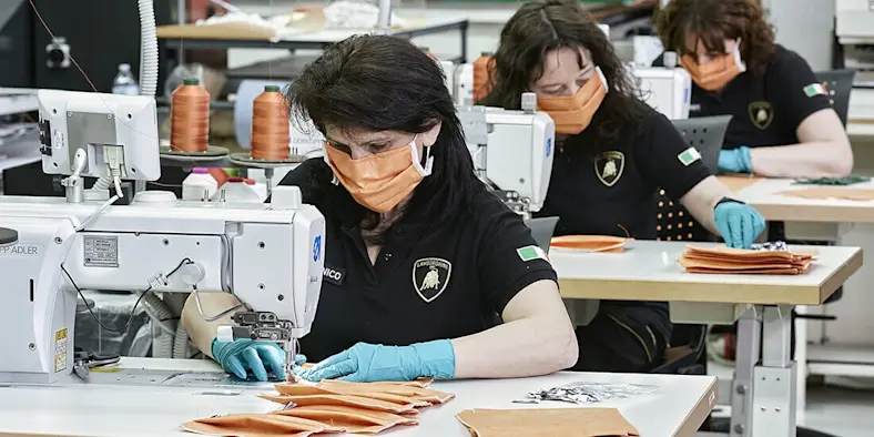 Lamborghini factory upholsters sewing face masks