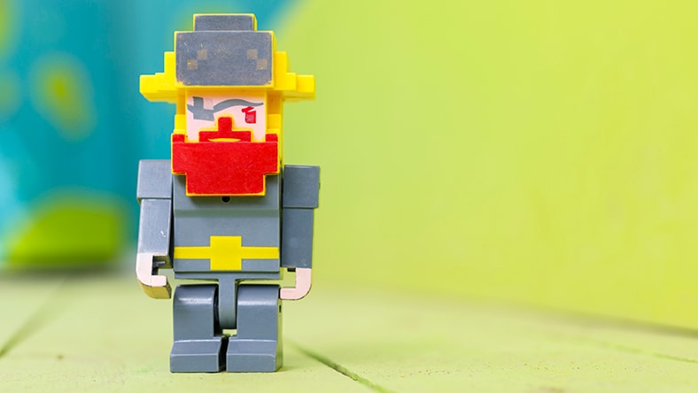 A plastic toy serves as a stop-motion movie character.