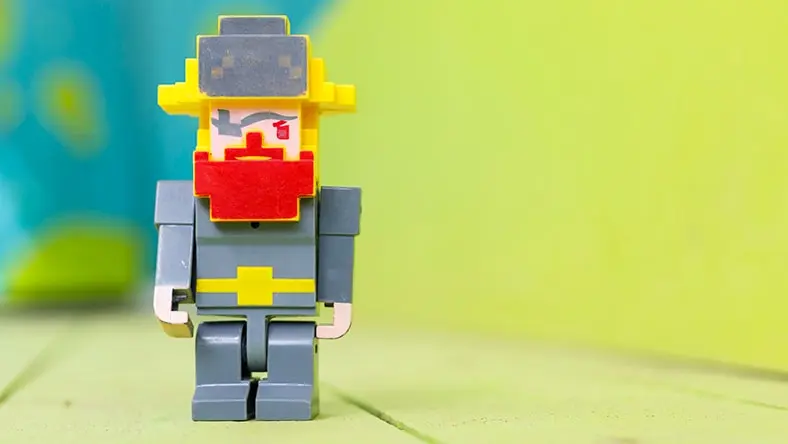 A plastic toy serves as a stop-motion movie character.