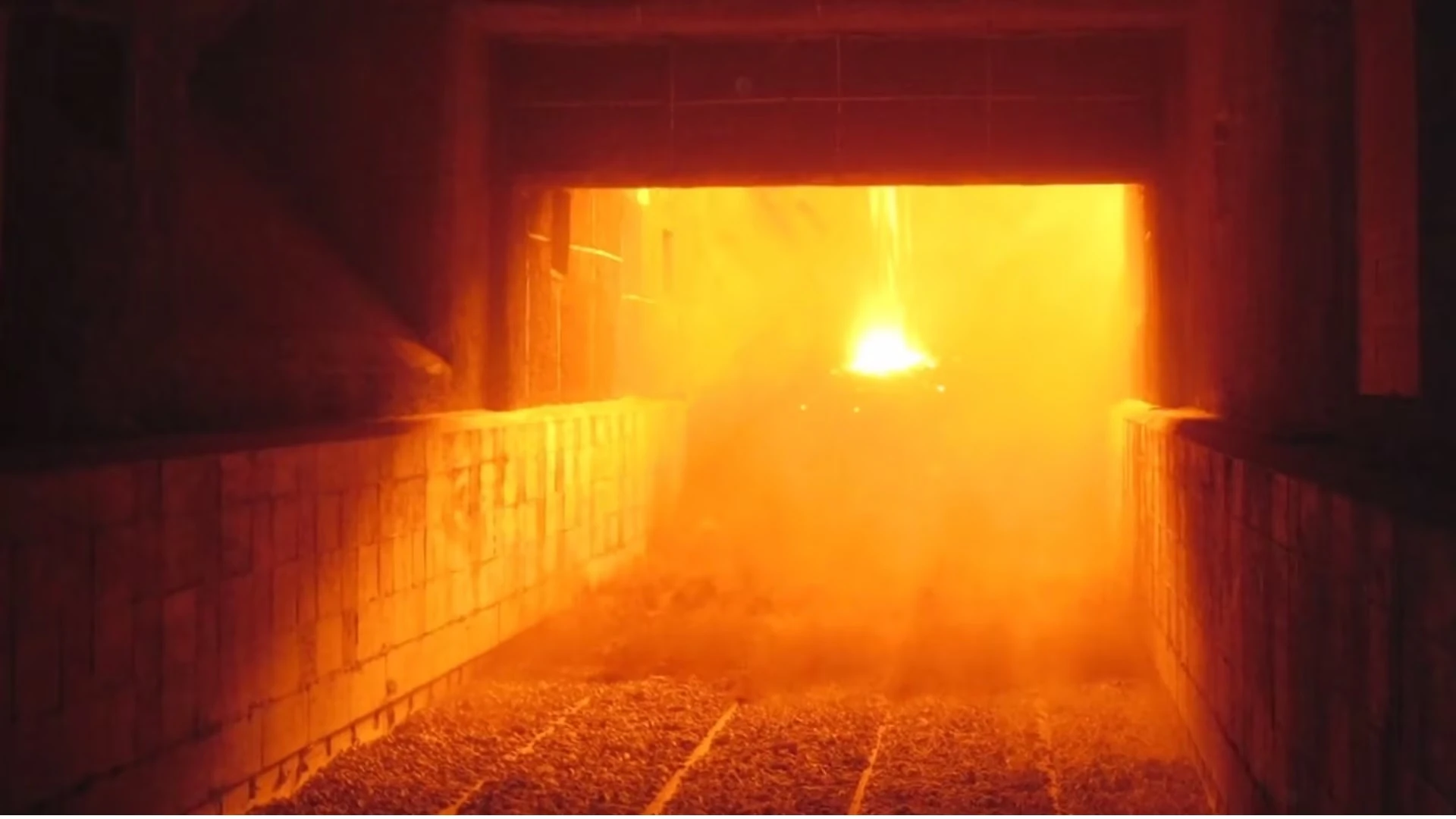 Molten-hot rock, or clinker, being transported inside the clinker cooler.