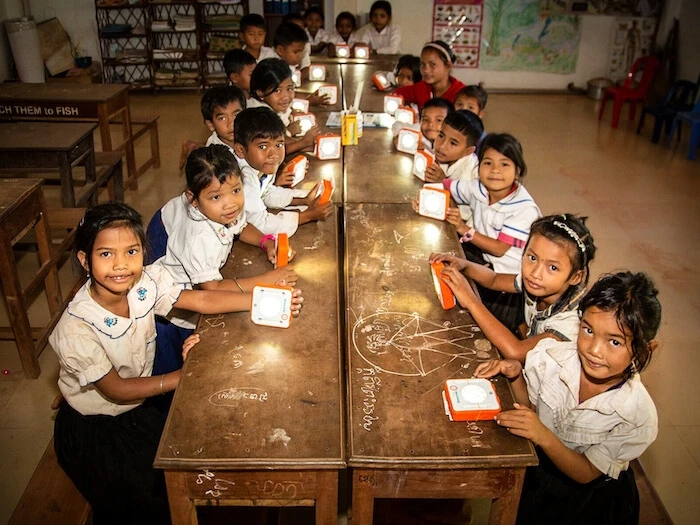 Kids with SolarBuddy at a school in Cambodia