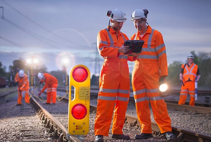 railway employees working at the tracks
