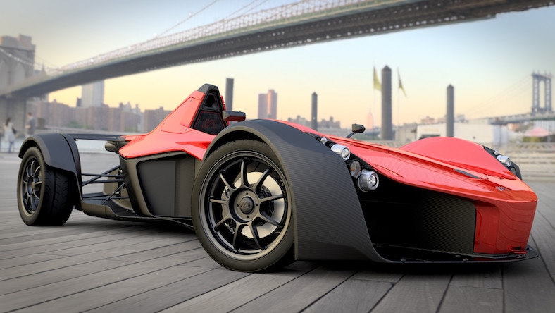 A futuristic car is on display on a dock.