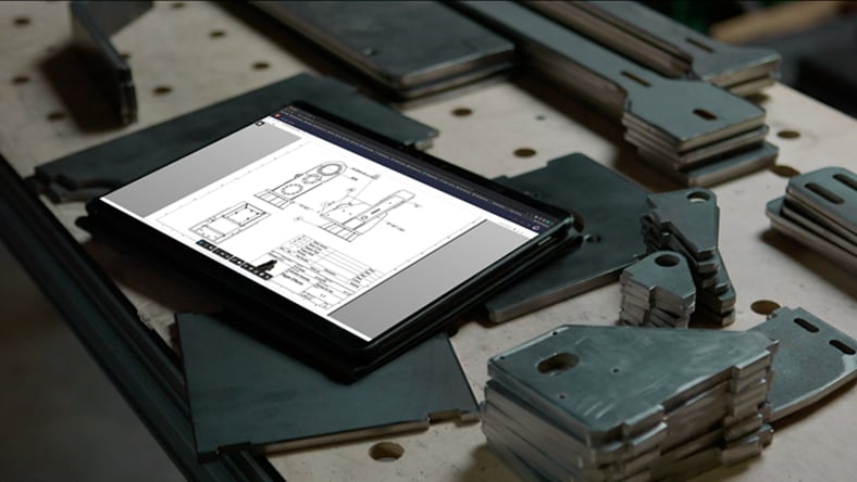 Sheet metal design software showing flat metal parts with consistent thickness. Defines bend radii, relief sizes, and automatically applies them during design. Creating flanges adds bends automatically for manufacturing.