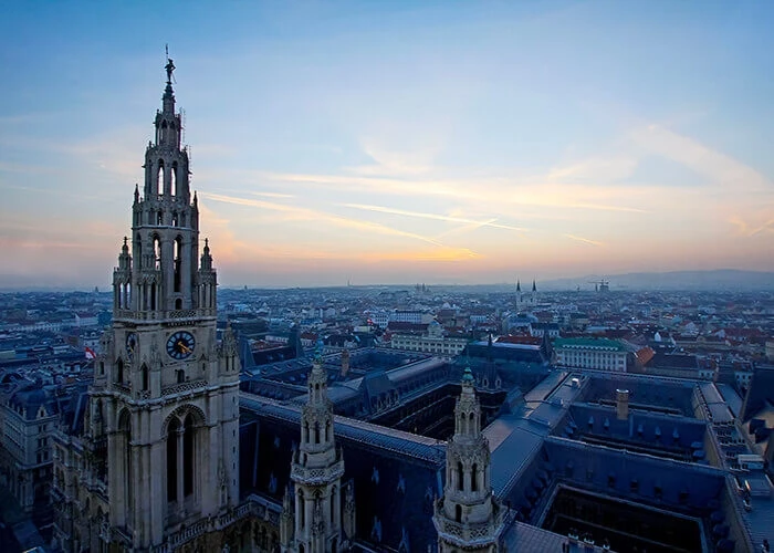 Vienna and the city hall at dusk. The city will soon have a green oasis in its center.