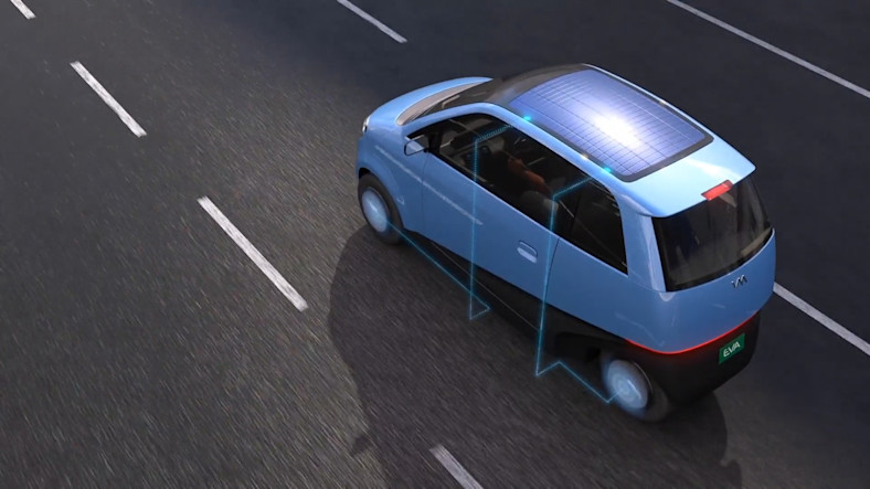 Rendering of a Vavye EVA prototype on a road, overhead view shows the rooftop solar panel.