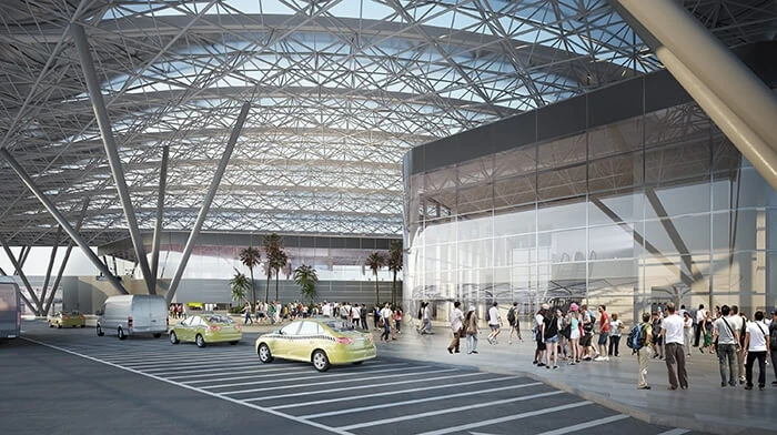 Una gran cubierta metálica de 16 000 metros cuadrados se levanta por encima de otros edificios de la terminal para protegerlos de las inclemencias del tiempo.