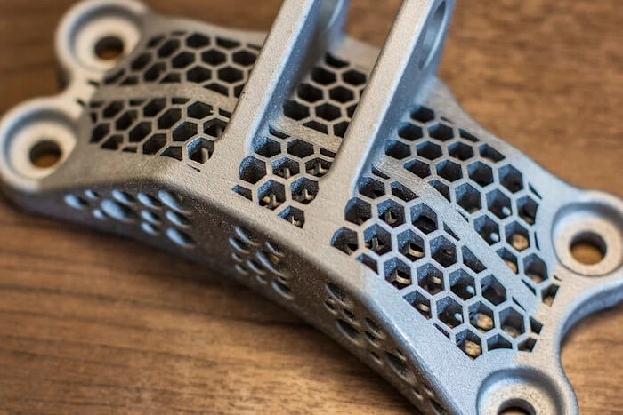 Close-up of a 3D-printed metal part from Xometry