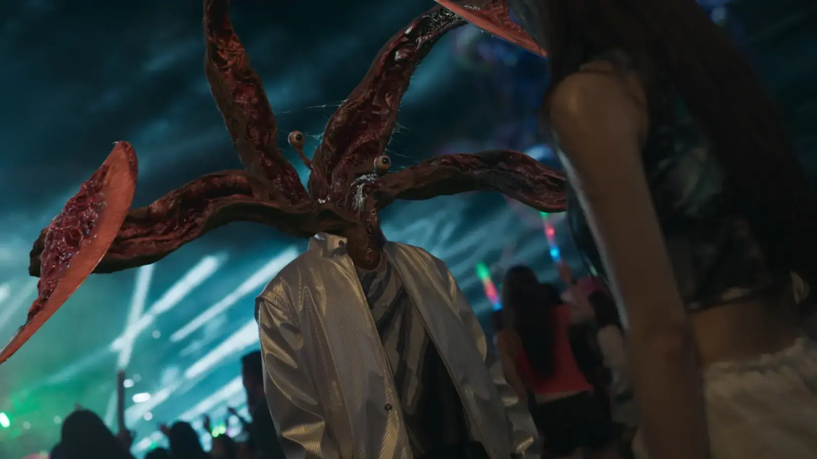 A still from Parasyte: The Grey shows a person with alien tentacles and eyeballs on stalks in place of a human head.
