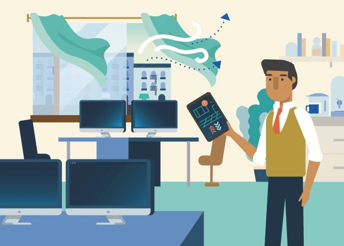 Illustration of a man checking building temperature using a digital twin on a tablet