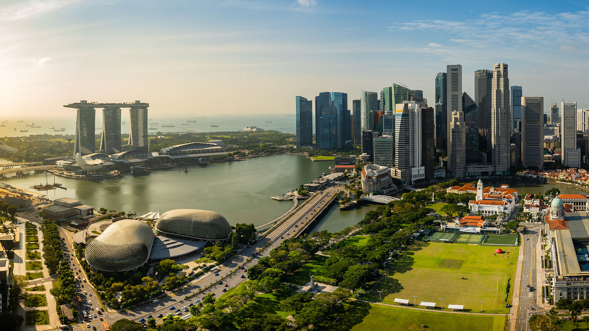 An aerial view shows the Marina Bay District of Singapore and the city skyline. 