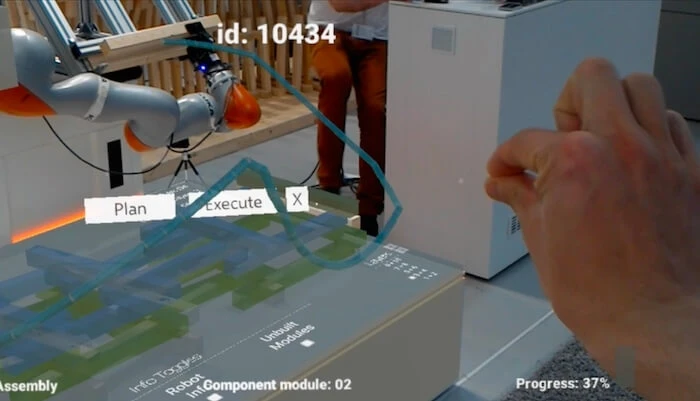 Using an AR headset, the CRoW user can digitally place the next piece of a construction, assessing data and trying alternative positions digitally. 