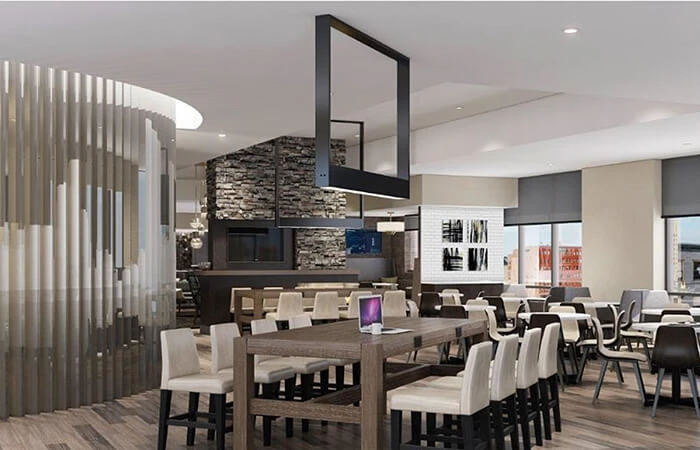 Rendering of interior hotel space with many tables and chairs